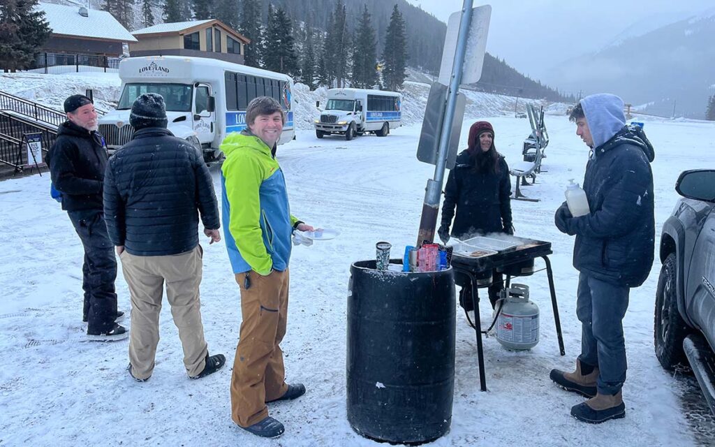Snowboarders and Skiers for Christ making pancakes in the Loveland Ski Area parking lot
