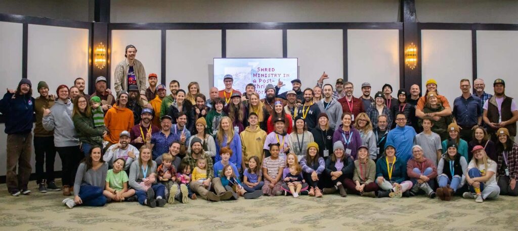 Group photo of snowboarders and skiers for christ conference 2022